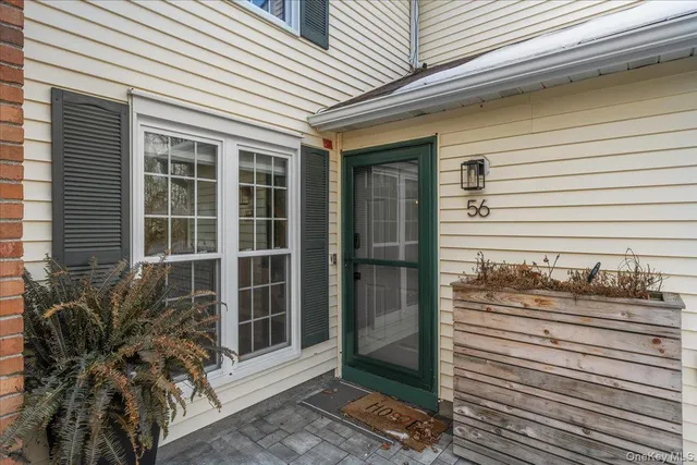 a view of a entryway front of a house