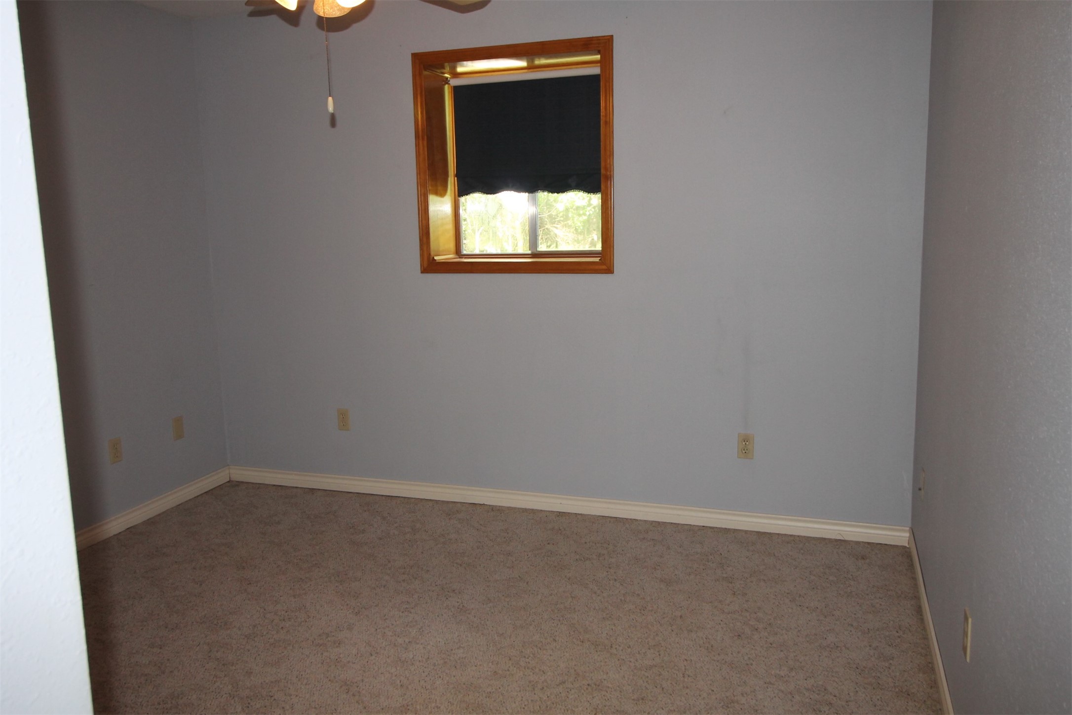 1528 County Road 2005 Liberty, TX 77575 - Photo 19 of 26 an empty room with a window
