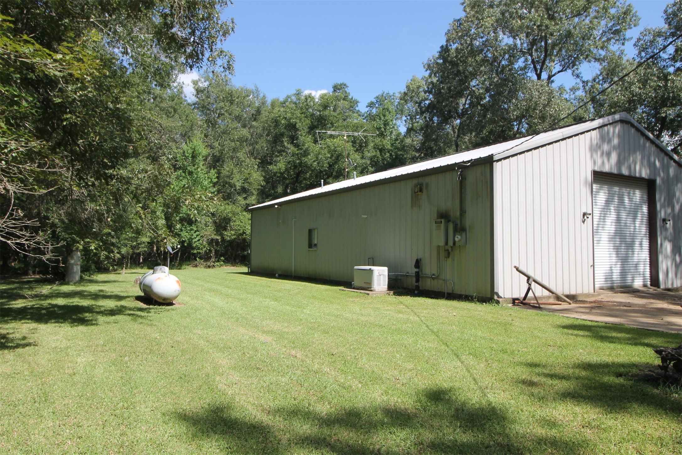 1528 County Road 2005 Liberty, TX 77575 - Photo 3 of 26 a view of a backyard