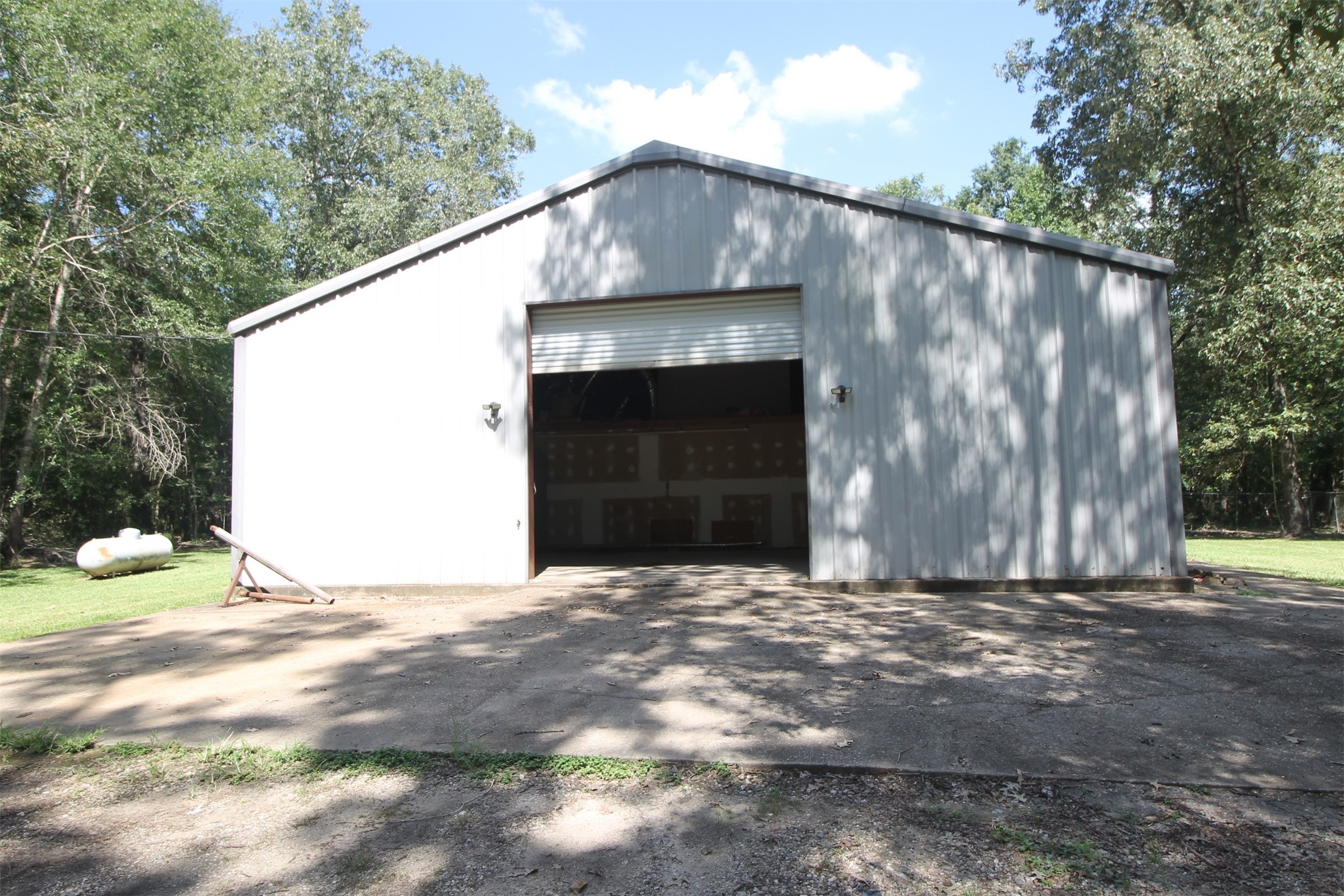 1528 County Road 2005 Liberty, TX 77575 - Photo 6 of 26 a backyard of a house