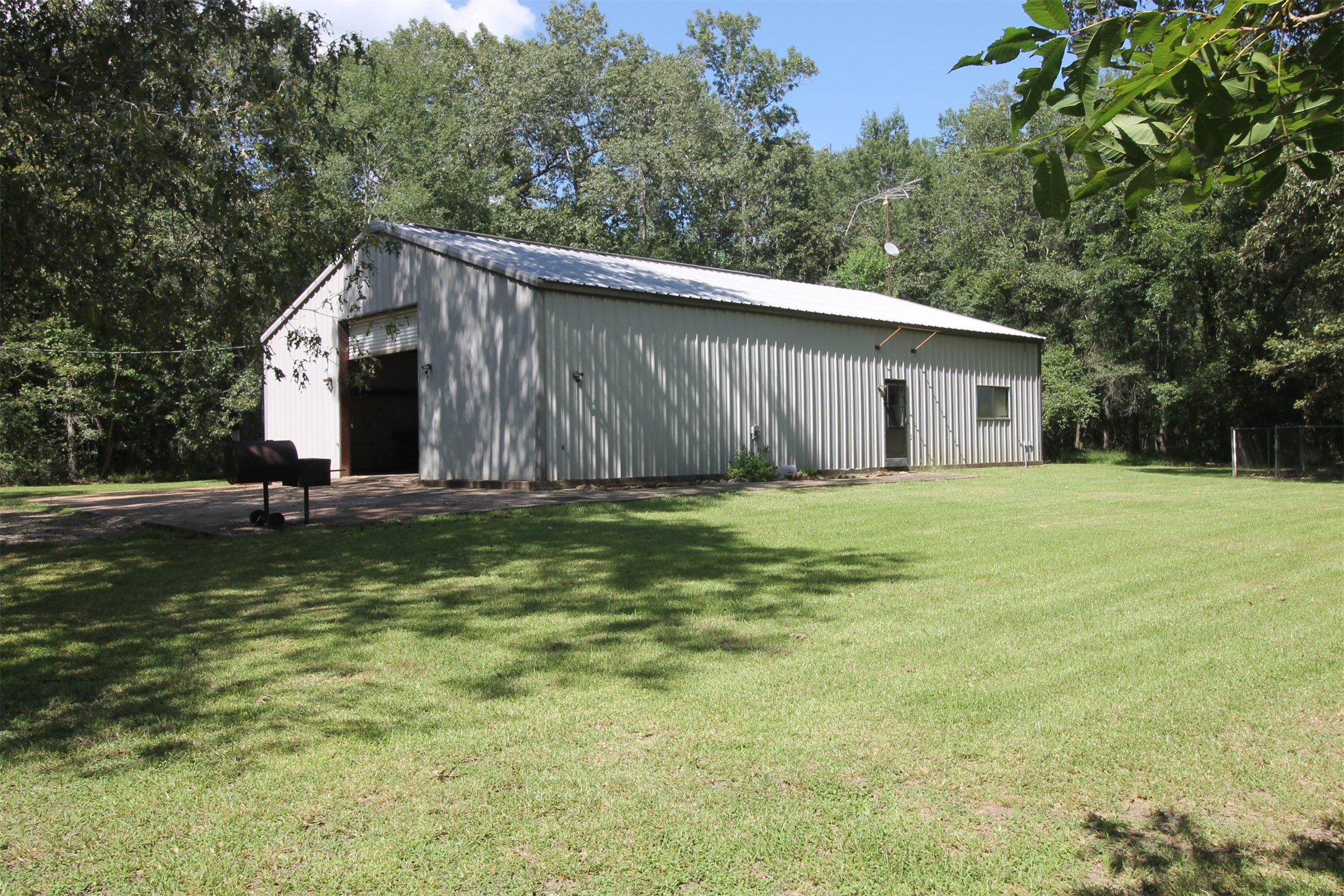 1528 County Road 2005 Liberty, TX 77575 - Photo 7 of 26 a view of a small house