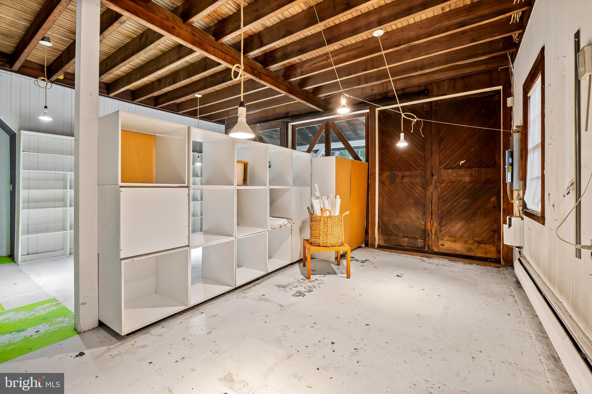7901 Ruxwood Road Baltimore, MD 21204 - Photo 49 of 85 a view of an empty room with wooden walls