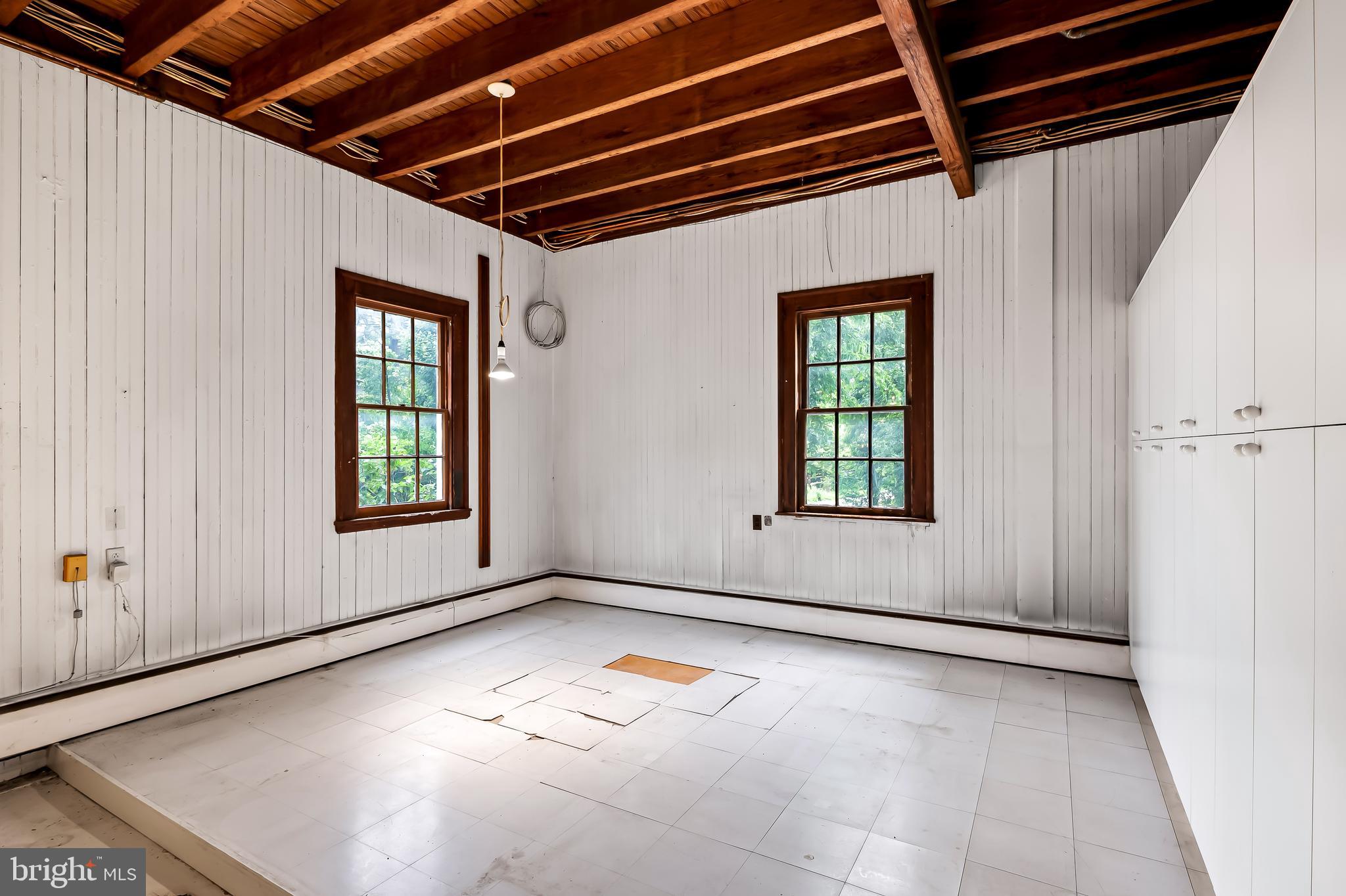 7901 Ruxwood Road Baltimore, MD 21204 - Photo 56 of 85 a view of an empty room with a window