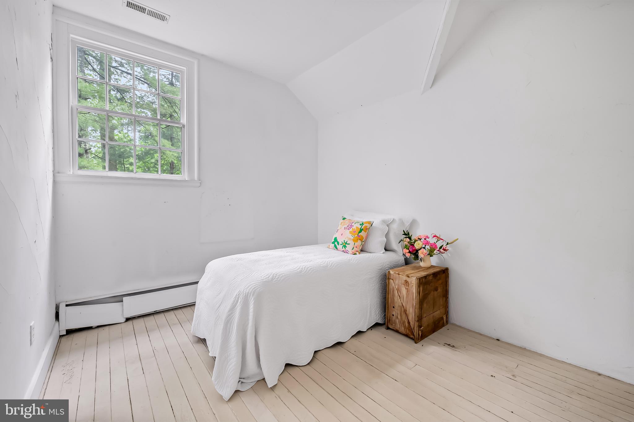 7901 Ruxwood Road Baltimore, MD 21204 - Photo 62 of 85 a bedroom with a bed and a window