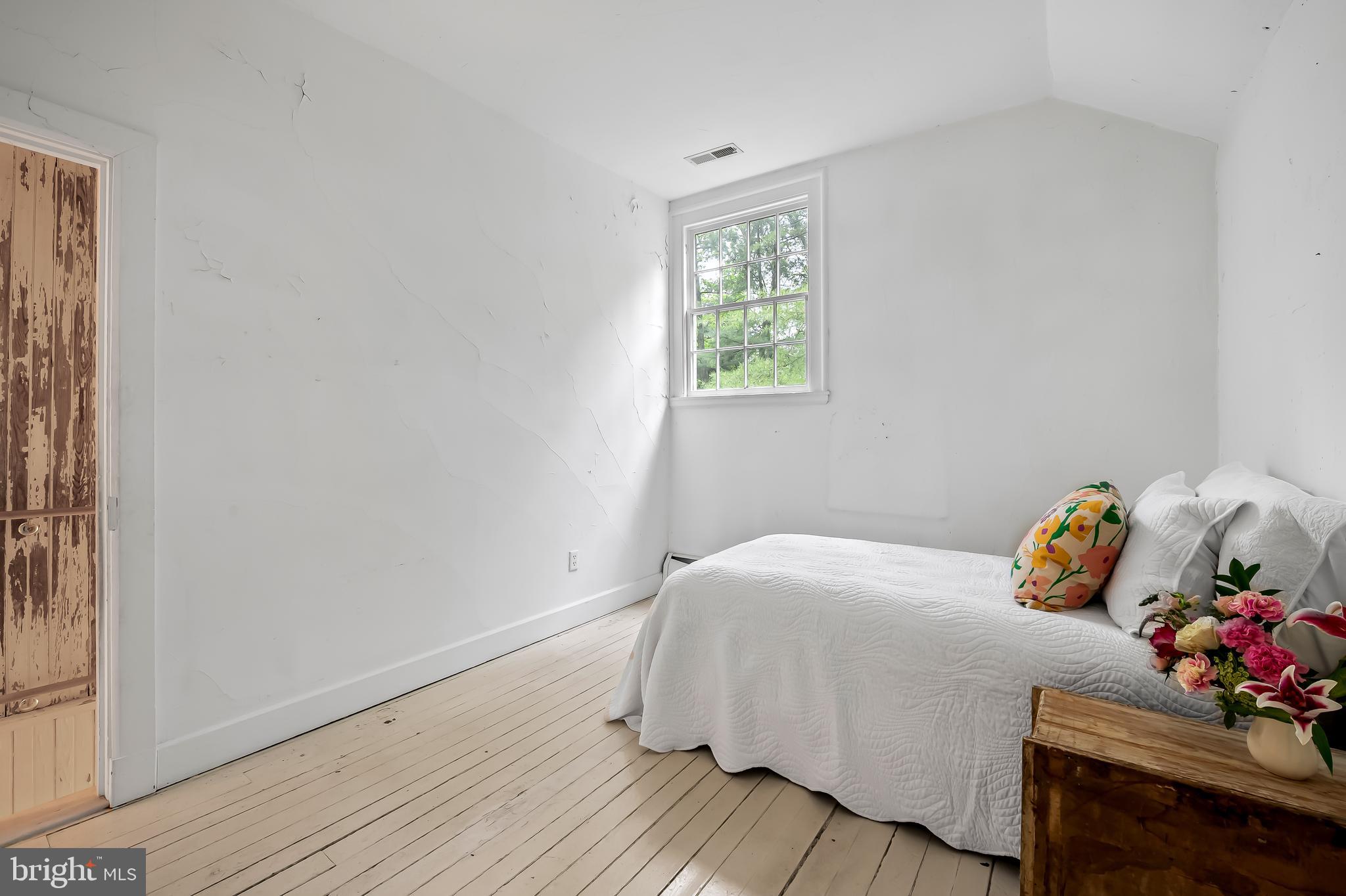 7901 Ruxwood Road Baltimore, MD 21204 - Photo 64 of 85 a bedroom with a bed and a window