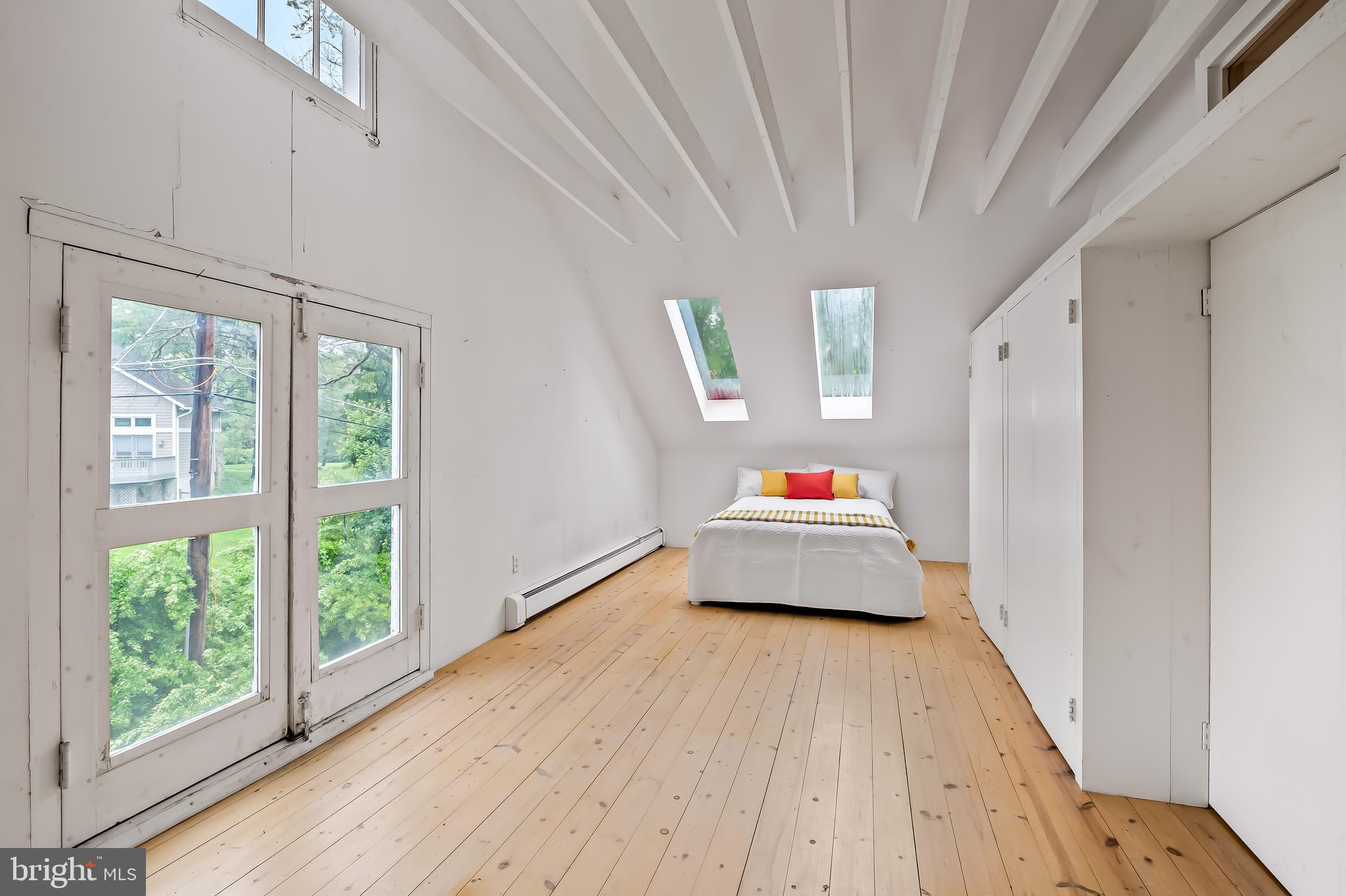 7901 Ruxwood Road Baltimore, MD 21204 - Photo 77 of 85 a bedroom with a bed and a large window