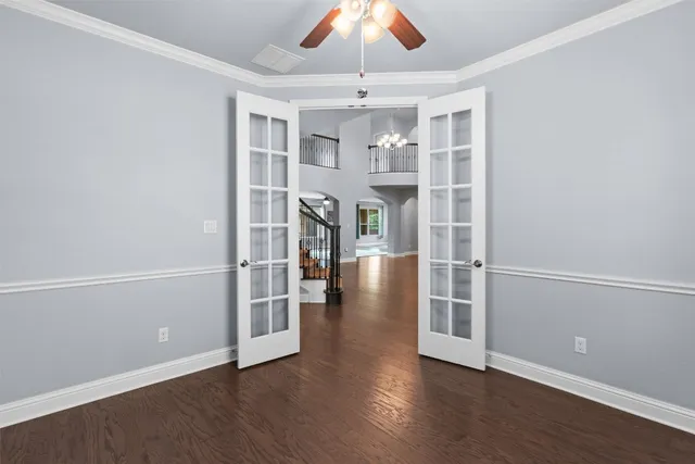 a white toilet sitting next to a bathroom sink
