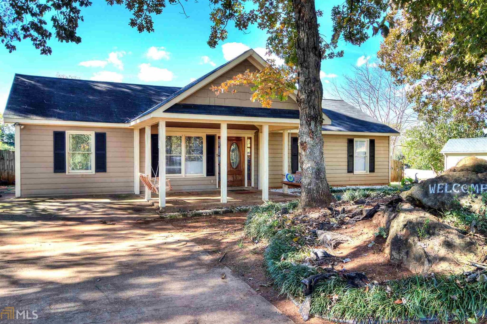 53 Jennifer Lane, Unit 22 Rydal, GA 30171 - Photo 1 of 1 a front view of a house with garden