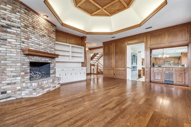 a view of a livingroom with wooden floor