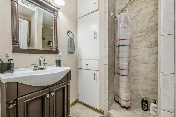 a view of workspace with wooden floor windows and chair