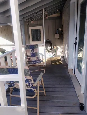 a view of living room and kitchen with furniture