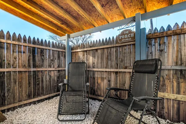 a kitchen with granite countertop a stove sink and cabinets