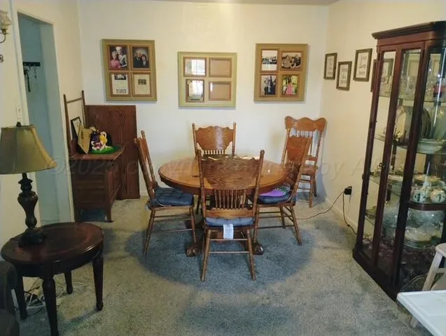 a view of a livingroom with furniture and a couch