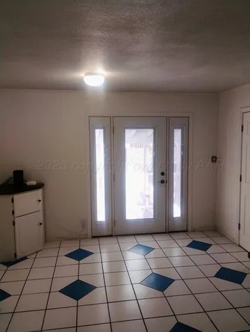 a view of a livingroom with a window