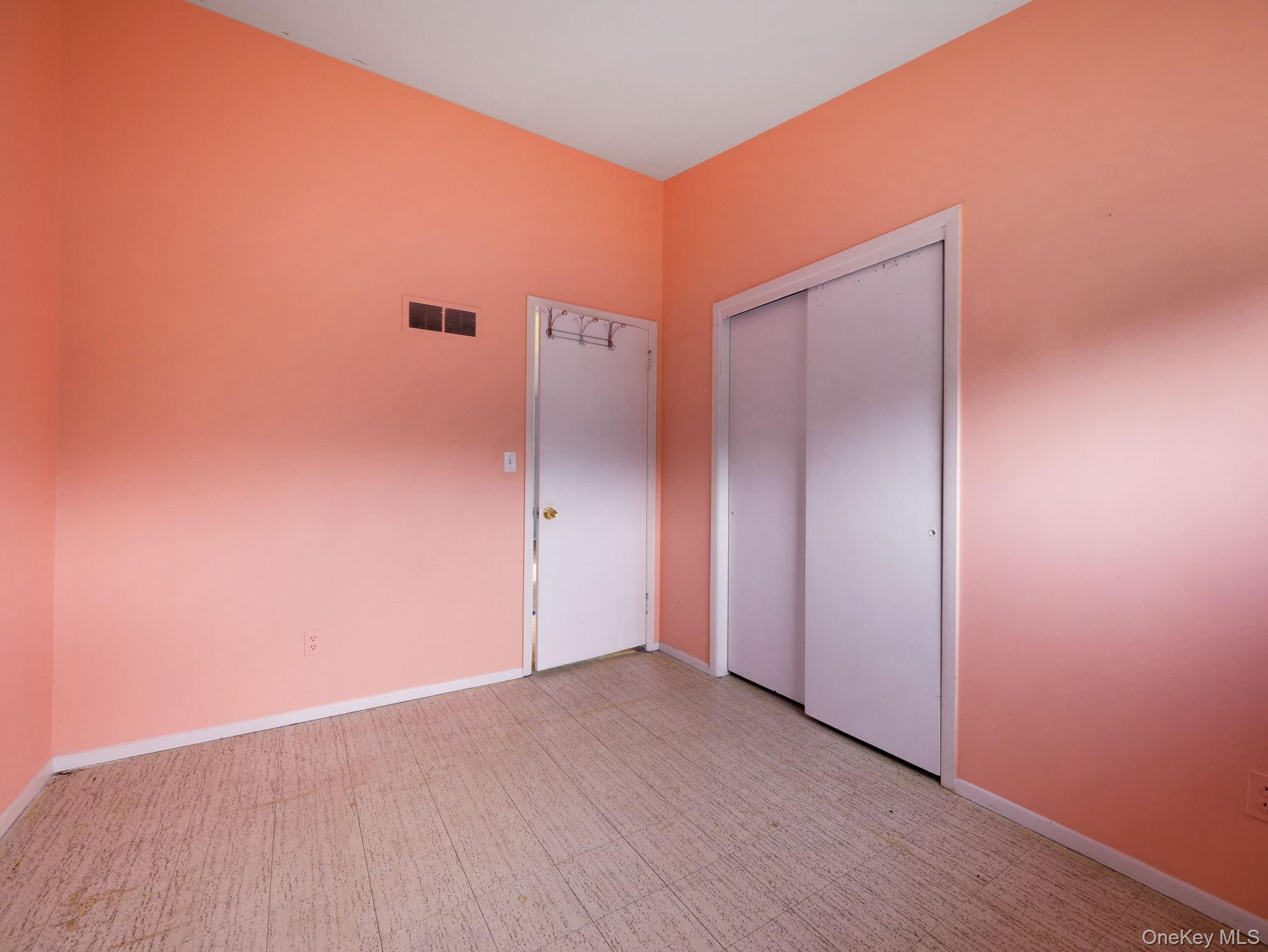 6 Pennington Way Spring Valley, NY 10977 - Photo 23 of 34 Bedroom featuring light floors and a closet