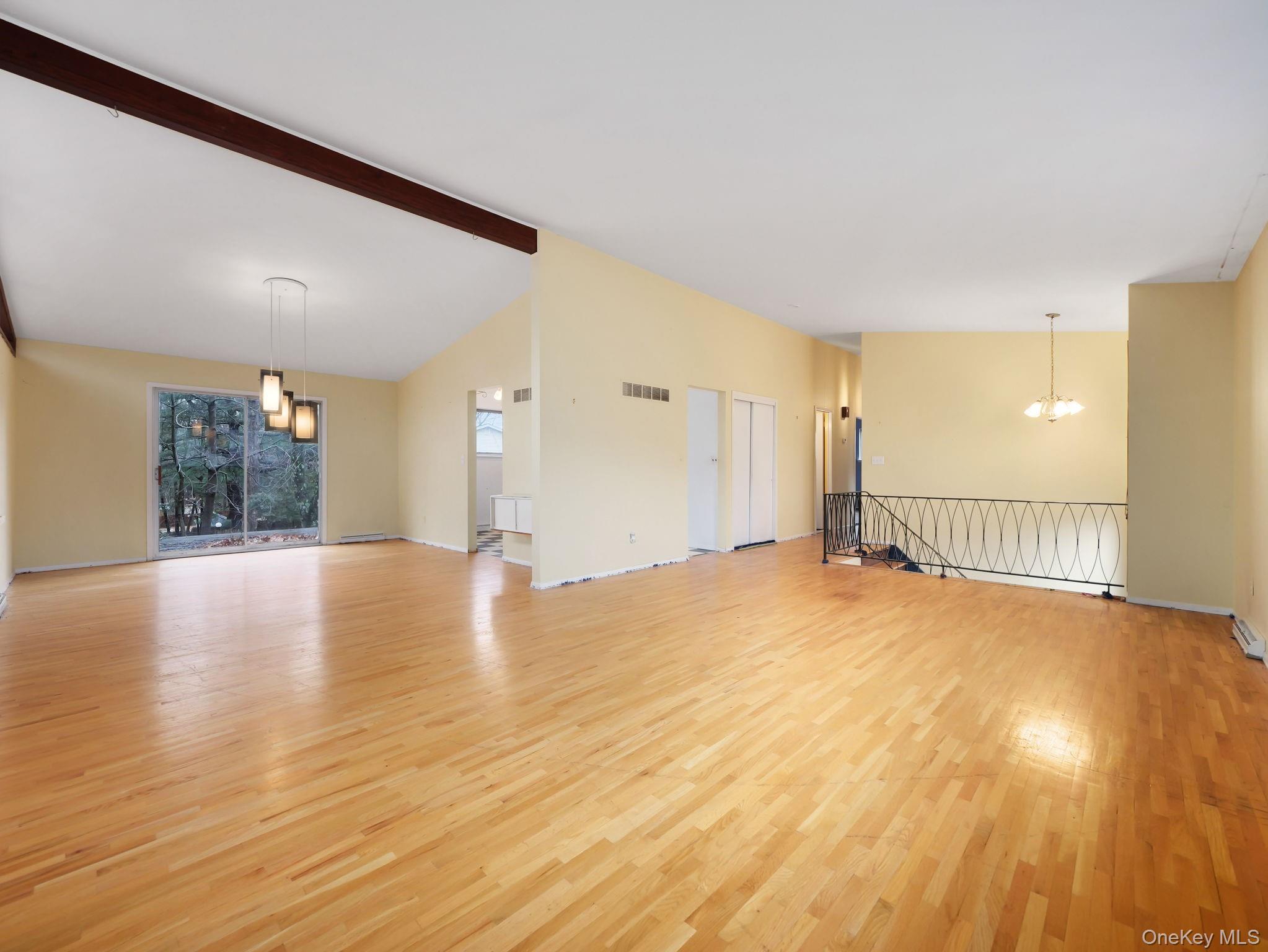 6 Pennington Way Spring Valley, NY 10977 - Photo 3 of 34 Living room featuring light hardwood flooring.