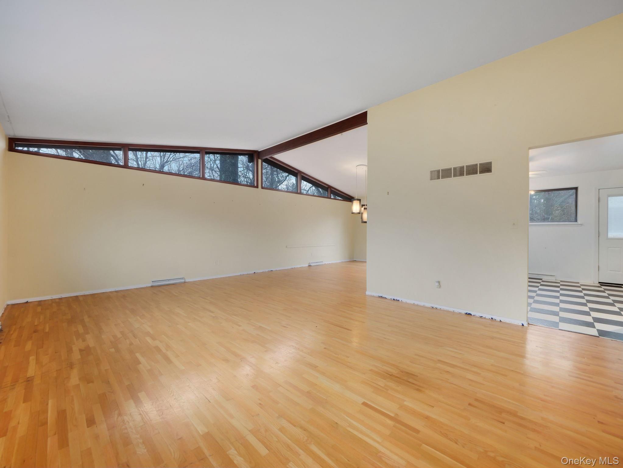 6 Pennington Way Spring Valley, NY 10977 - Photo 4 of 34 Spare room featuring light wood floors