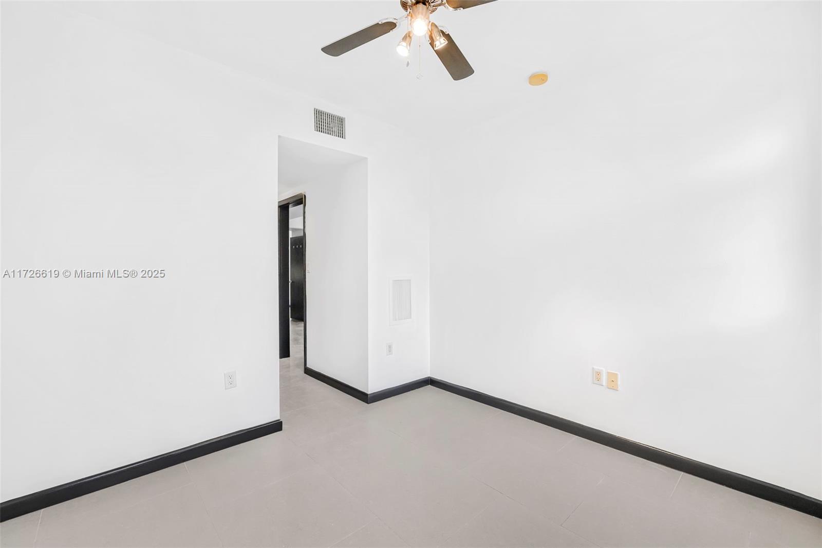 1876 Southwest 11th Terrace, Unit 302 Miami, FL 33135 - Photo 8 of 15 a view of a room with closet
