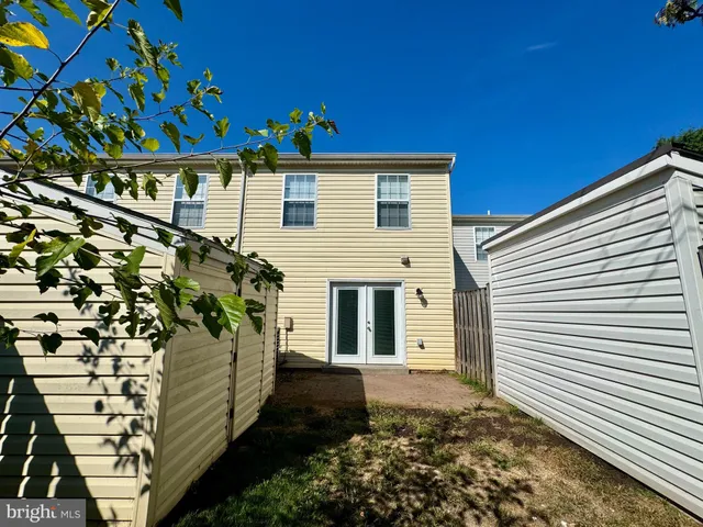 a view of a back yard of the house