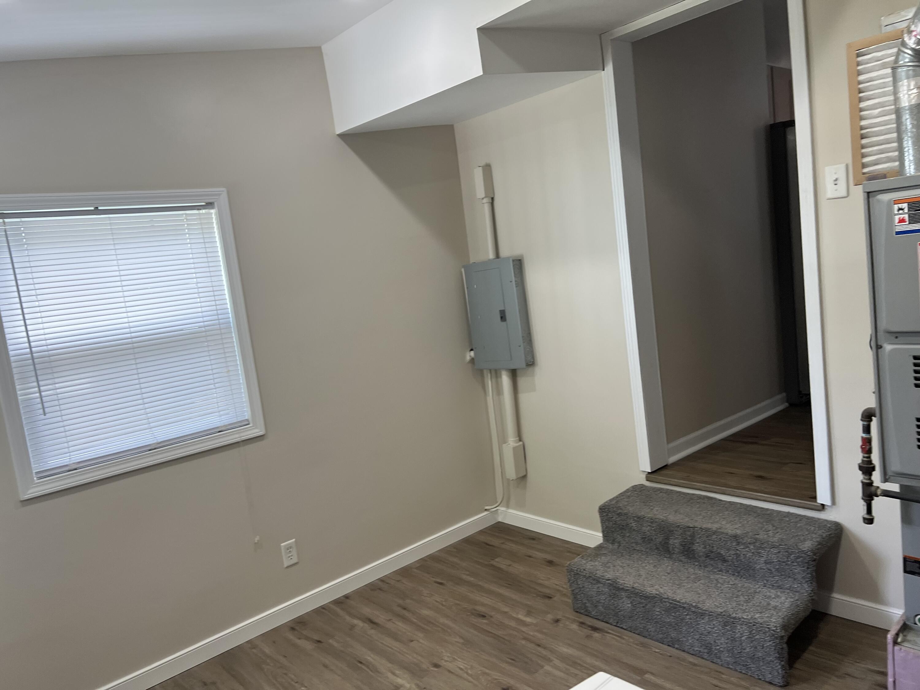 3851 Maple Street Hobart, IN 46342 - Photo 21 of 28 an entryway with wooden floor and a window