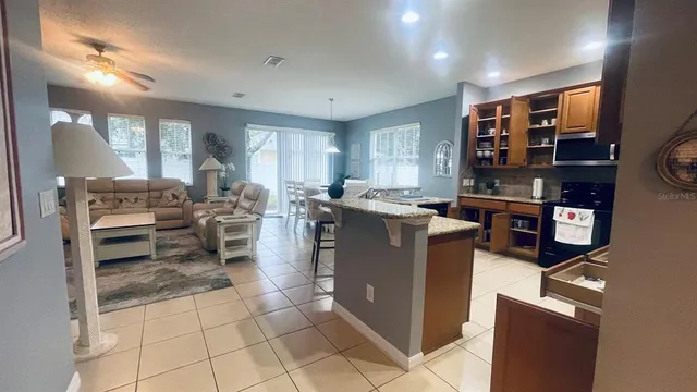 a room with furniture a washer and dryer