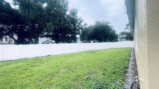 a view of yard with trees