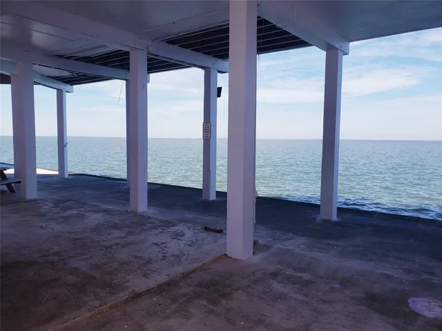 a view of a room with a balcony