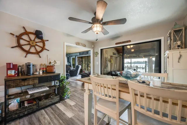 a kitchen with stainless steel appliances granite countertop a refrigerator and a stove