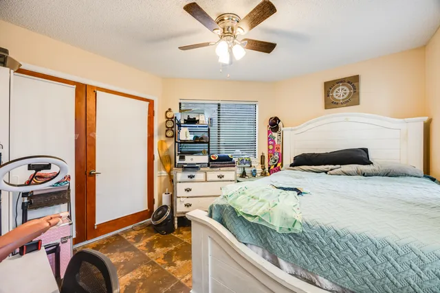 a kitchen with a sink cabinets and window