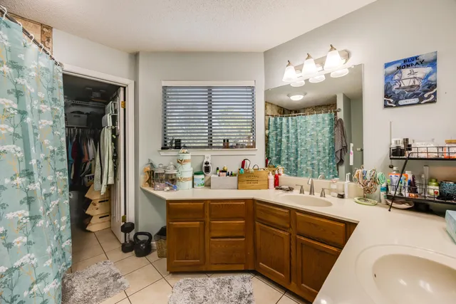 a view of a backyard with sitting area