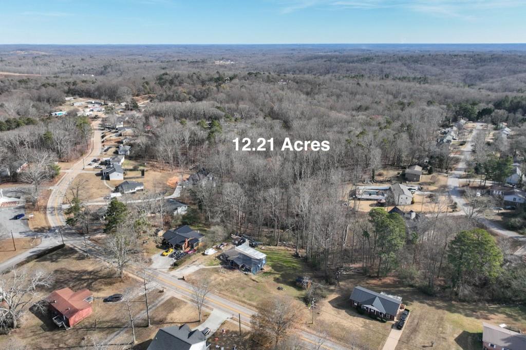 2246 Floyd Road Gainesville, GA 30507 - Photo 6 of 8 an aerial view of a house with a yard
