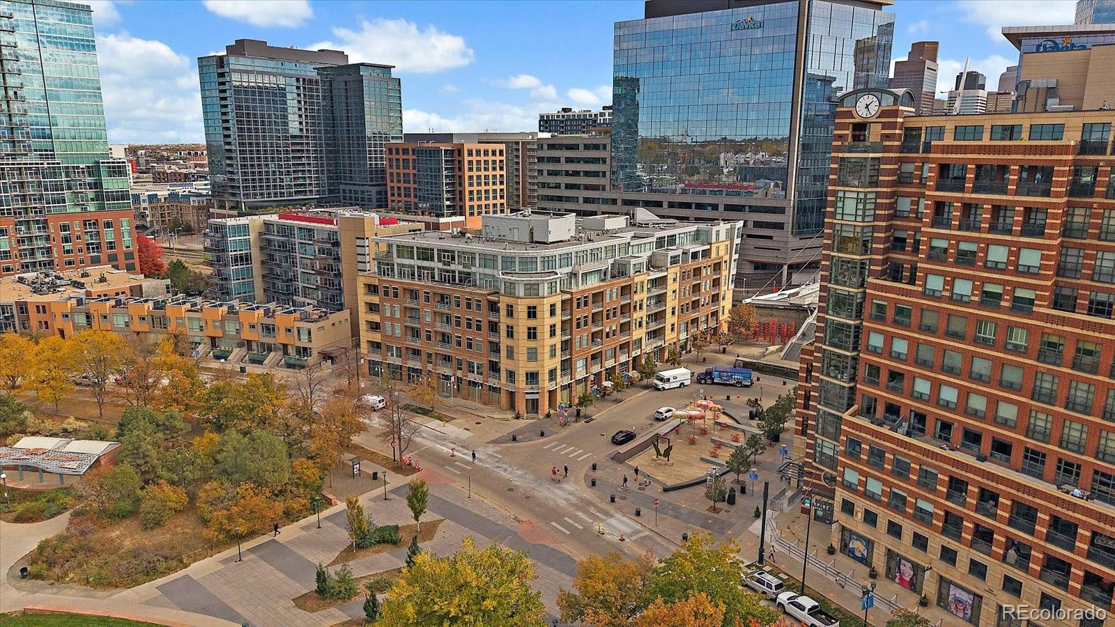 1610 Little Raven Street, Unit PH5 Denver, CO 80202 - Photo 3 of 44 a city view with tall buildings