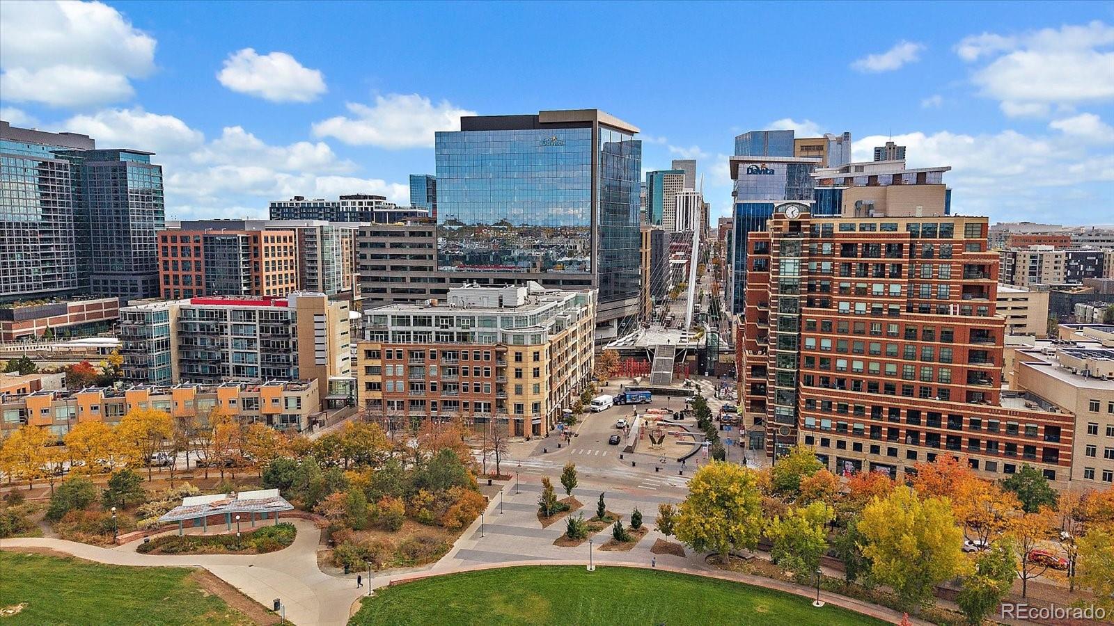 1610 Little Raven Street, Unit PH5 Denver, CO 80202 - Photo 4 of 44 a city view with tall buildings