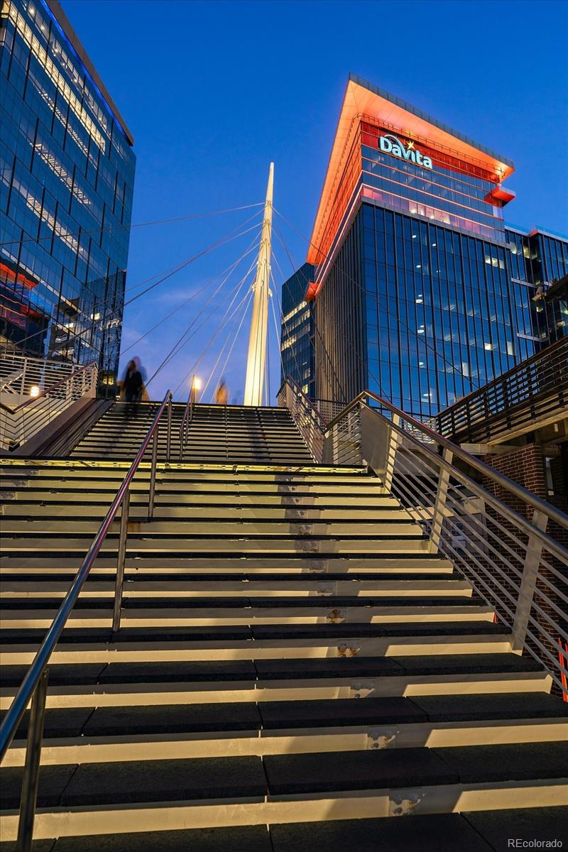 1610 Little Raven Street, Unit PH5 Denver, CO 80202 - Photo 42 of 44 a view of a street with stairs and wooden floor
