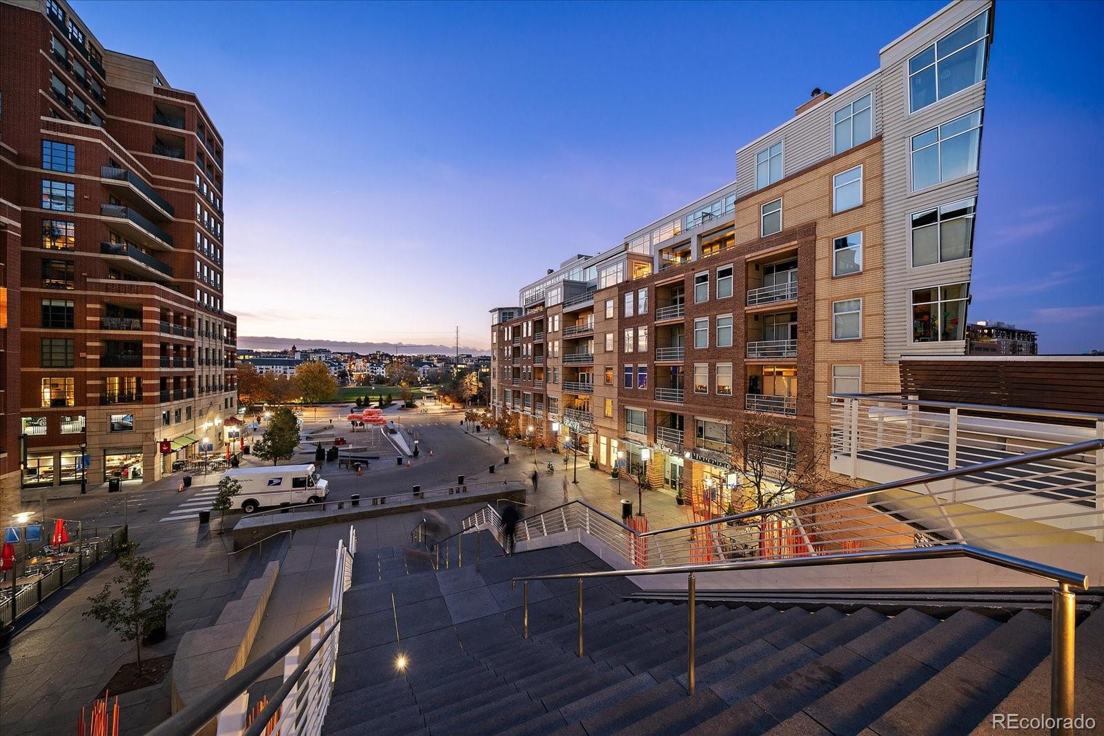 1610 Little Raven Street, Unit PH5 Denver, CO 80202 - Photo 43 of 44 a view of a balcony with wooden floor