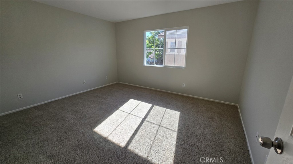 3272 Garons Lane Riverside, CA 92503 - Photo 13 of 25 Primary bedroom with in-suite bathroom