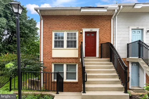 a front view of a house with a porch