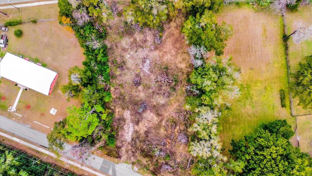 1650 Northwest 7th Street Ocala, FL 34475 - Photo 3 of 43 an aerial view of a houses with yard