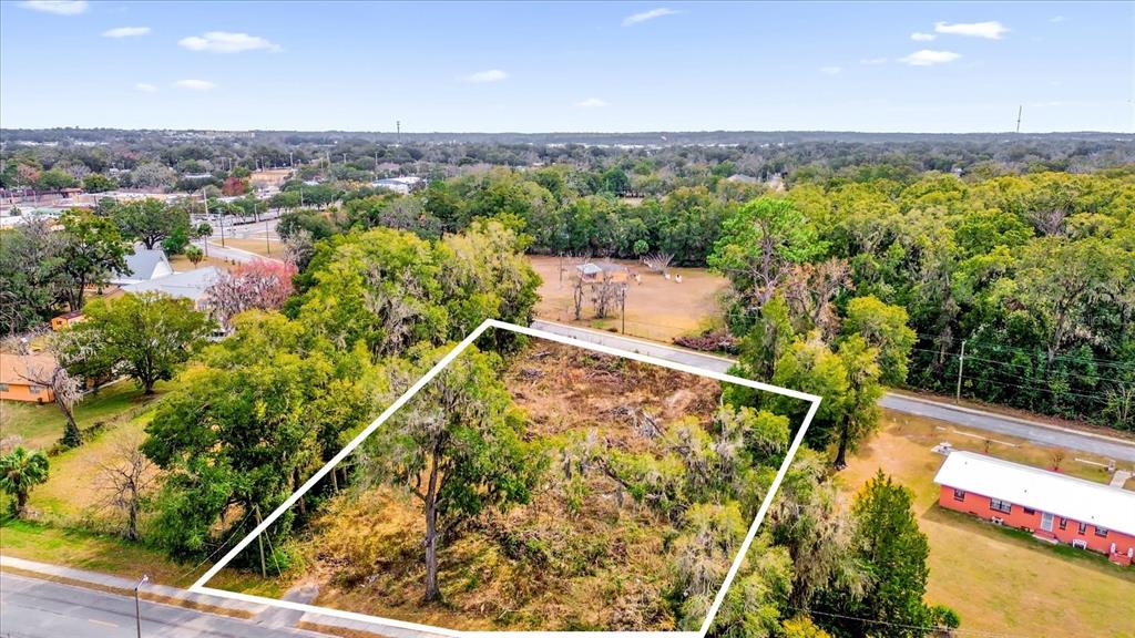 1650 Northwest 7th Street Ocala, FL 34475 - Photo 33 of 43 a view of a swimming pool with a lake view