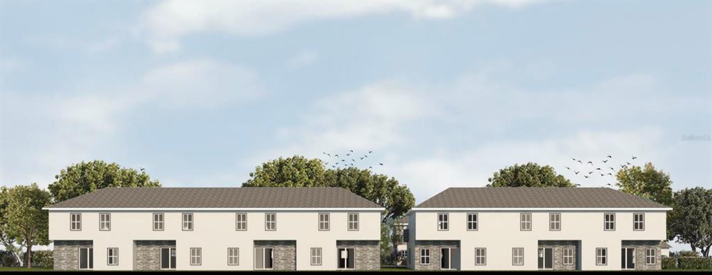 1650 Northwest 7th Street Ocala, FL 34475 - Photo 6 of 43 a front view of residential houses with yard