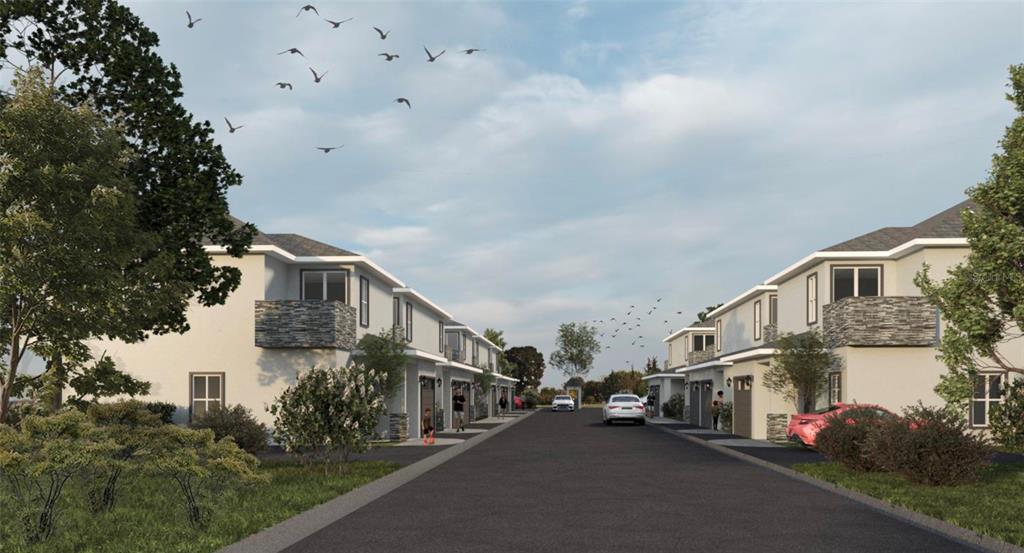 1650 Northwest 7th Street Ocala, FL 34475 - Photo 7 of 43 a city street lined with buildings and cars