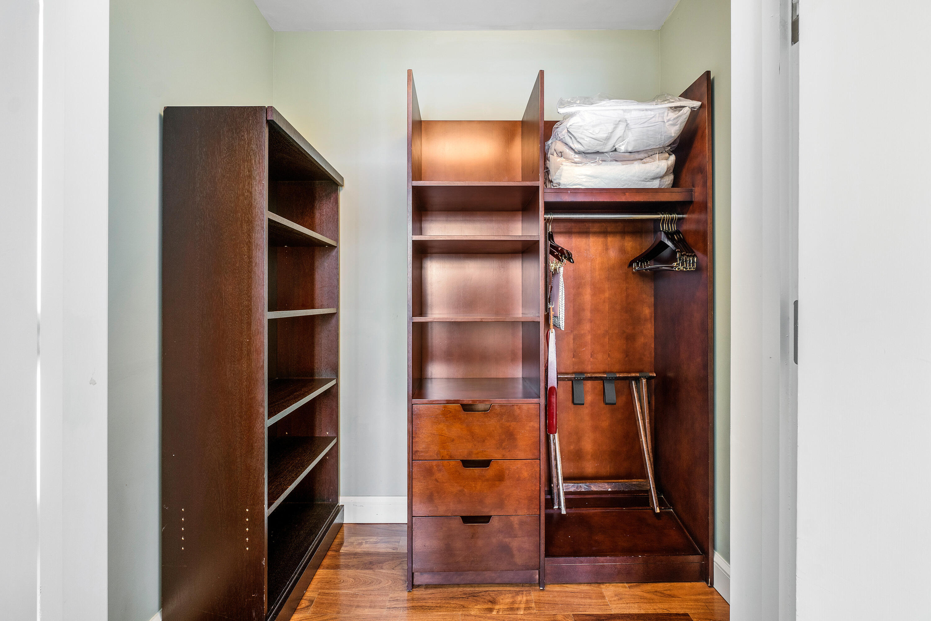 3800 North Ocean Drive Riviera Beach, FL 33404 - Photo 38 of 51 a room with wooden floor and closet