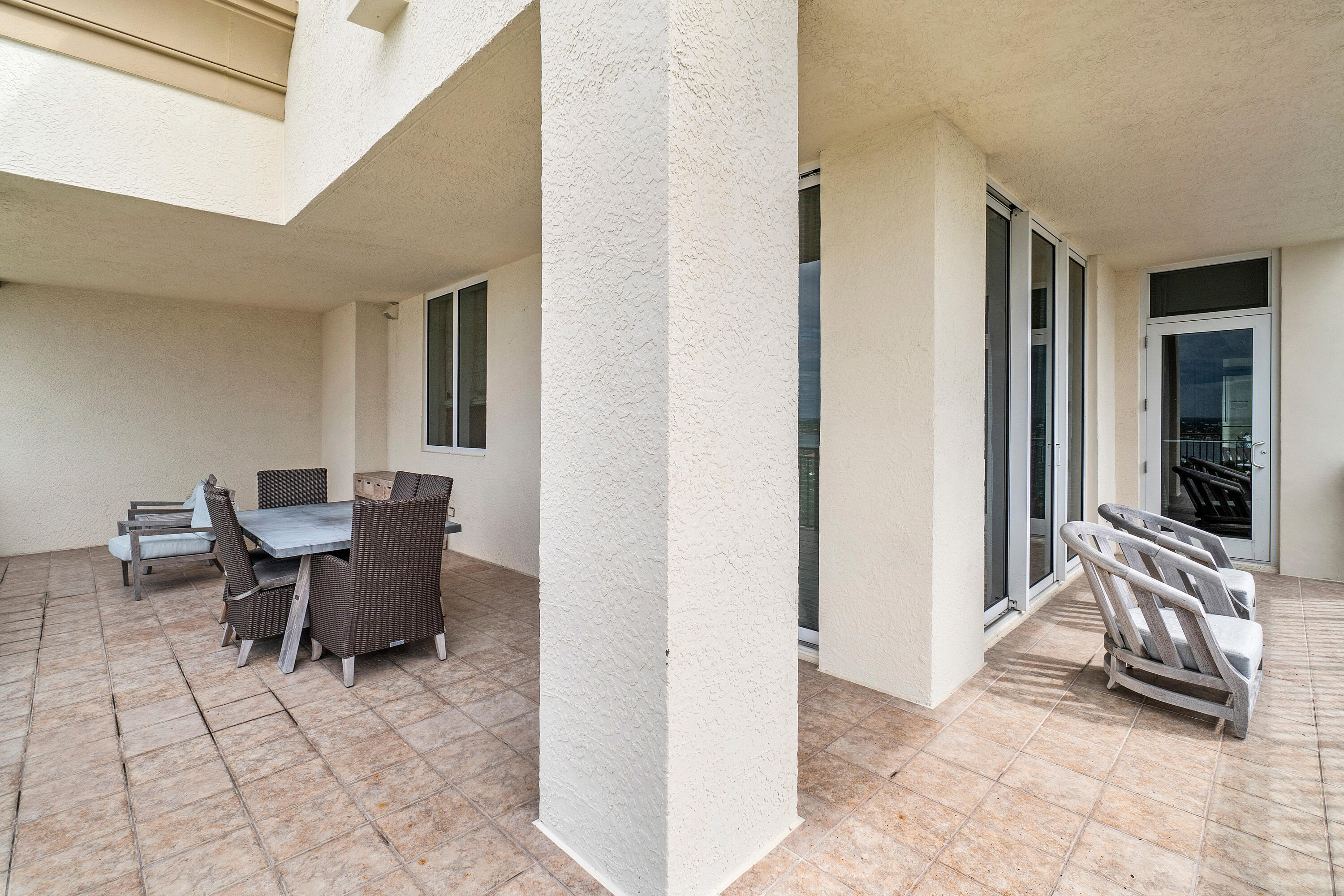 3800 North Ocean Drive Riviera Beach, FL 33404 - Photo 43 of 51 a view of a livingroom with furniture and windows