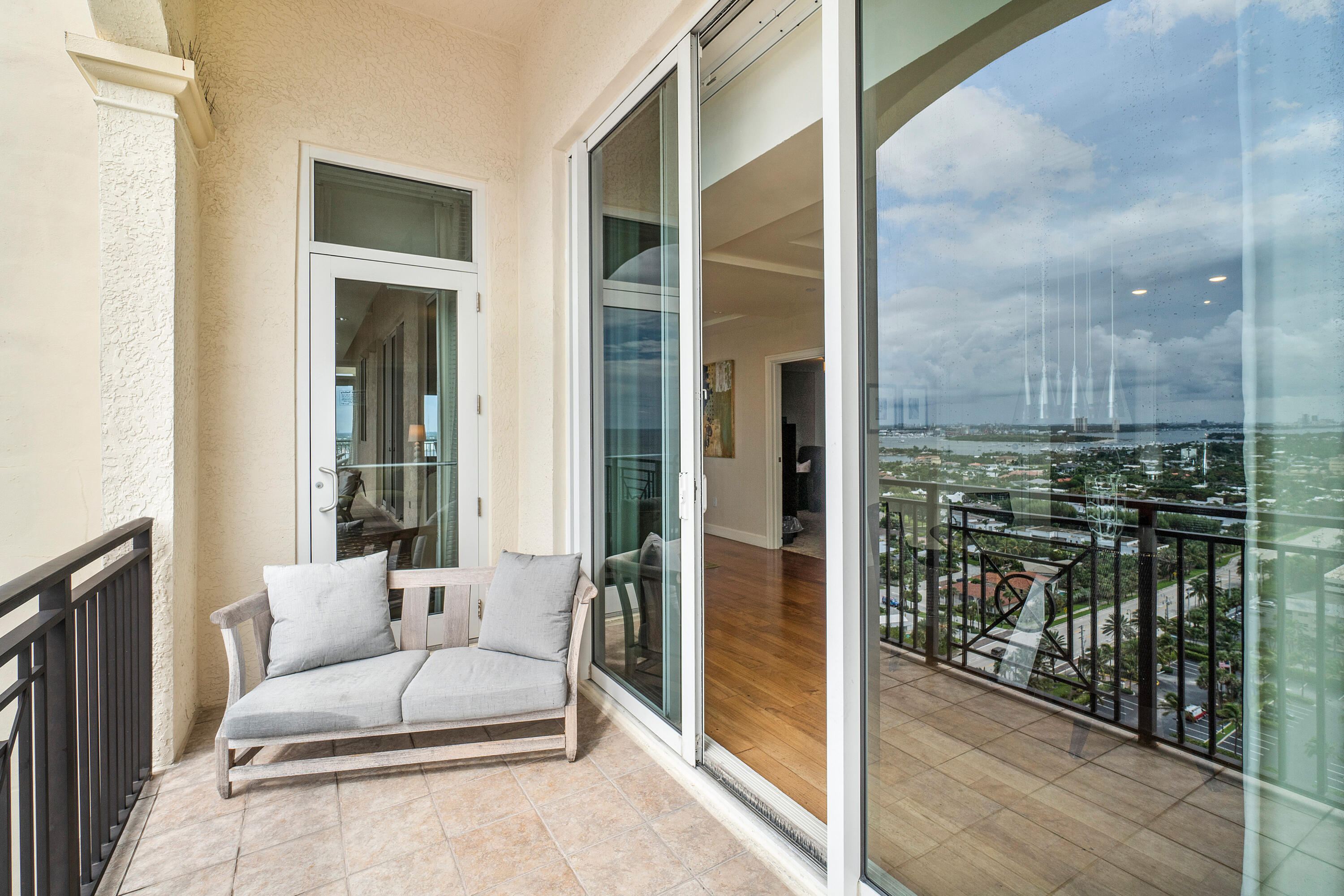 3800 North Ocean Drive Riviera Beach, FL 33404 - Photo 51 of 51 a balcony with furniture and large glass door