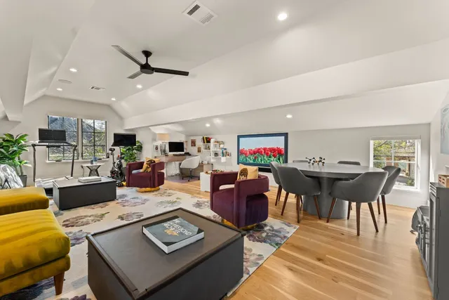 a view of a house with backyard sitting area and garden