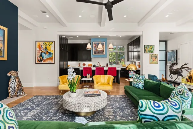 a living room with furniture and a rug