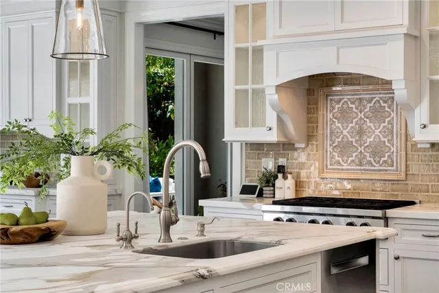 a view of a patio with couches and a fire pit