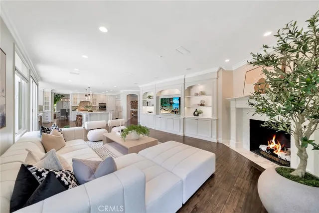 a view of a swimming pool with a patio and a garden