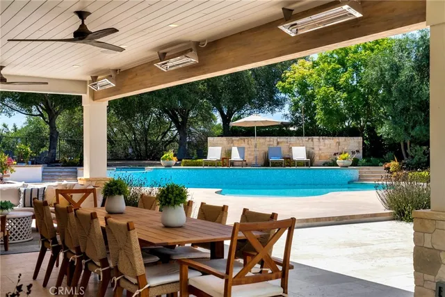 a group of people sitting in a living room