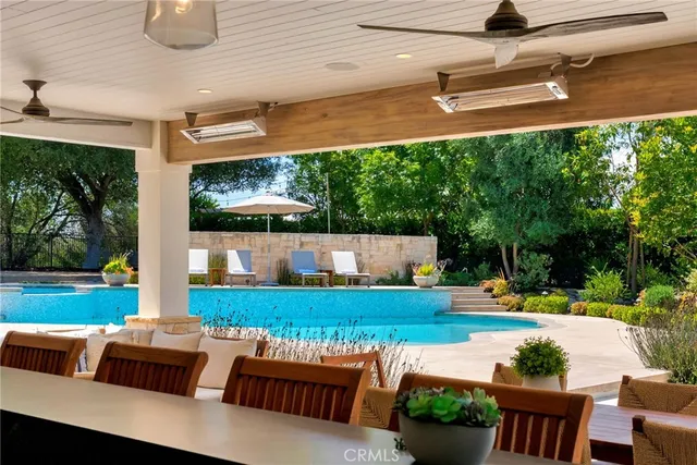 a view of a livingroom with furniture and a fireplace